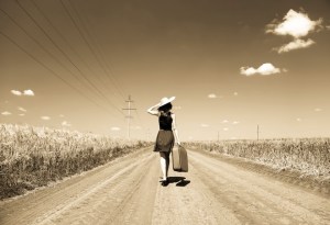 WomanAloneWithSuitcase